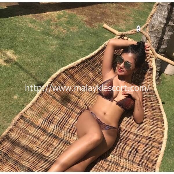 Malay Girl in bikini, sunbathing outdoors. Malay Escort, KL Escort, Malaysia Escort, Kuala Lumpur Escort, Sex Escort