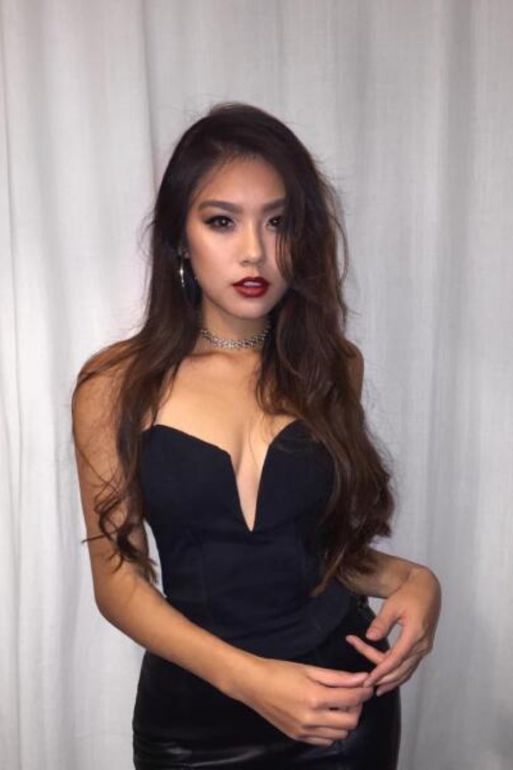 Beautiful Filipino girl, Cassandra, in black dress and choker necklace.