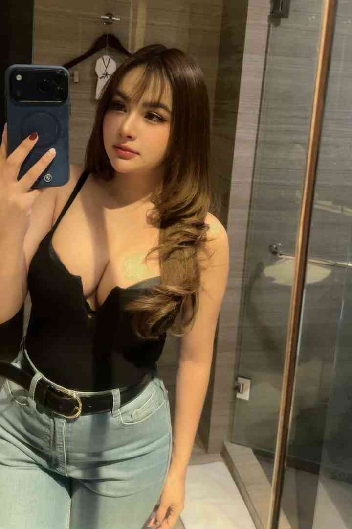 Isya 23 year old slim Malay escort in KL, 165cm 50kg, posing seductively for incall and outcall in Bukit Bintang